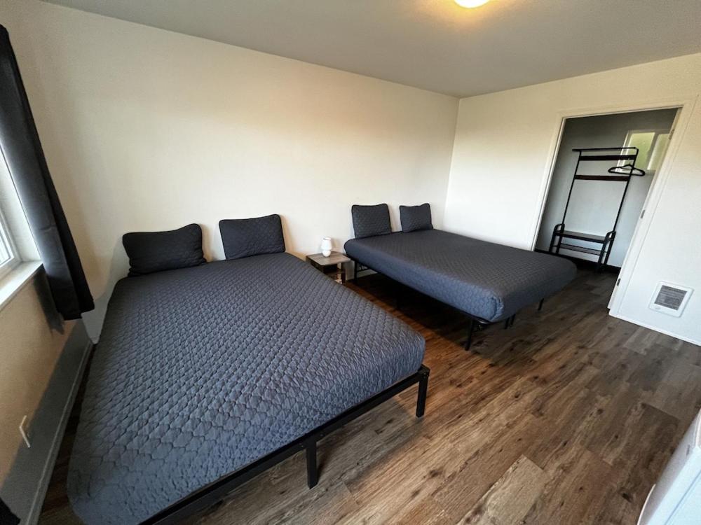 Hotel room with two double beds